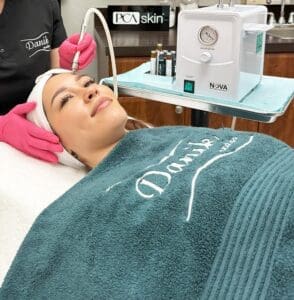 Pacient doing the Microdermabrasion treatment at Danik Med Spa