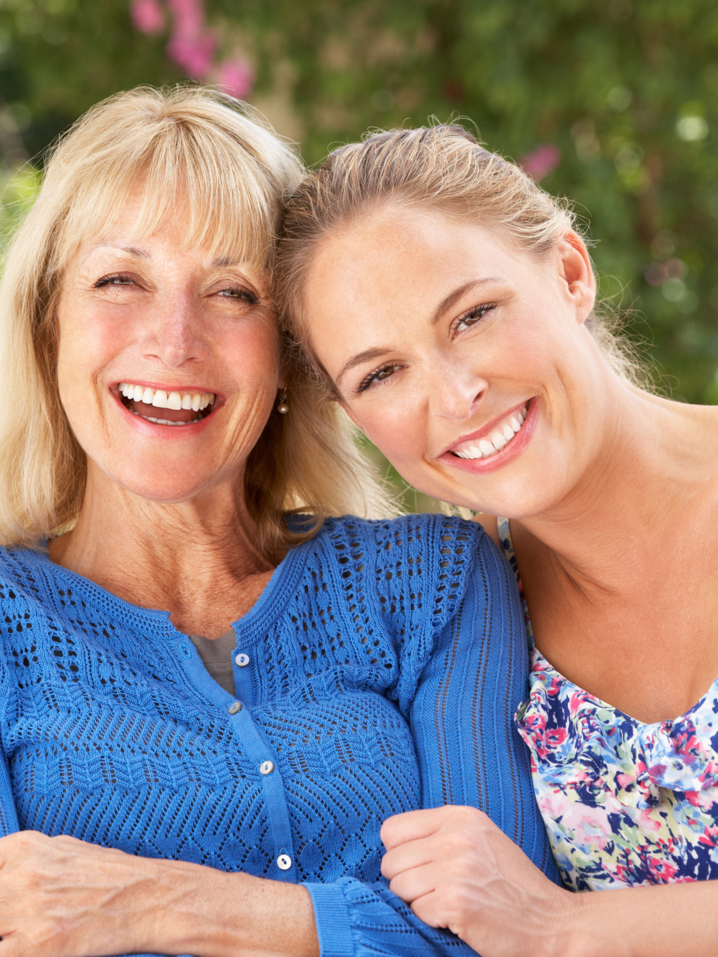Two Blonde Women Wearing A Sweater And A Blouse Posing Together Smiling For Viveve Vaginal Rejuvenation Treatment Page