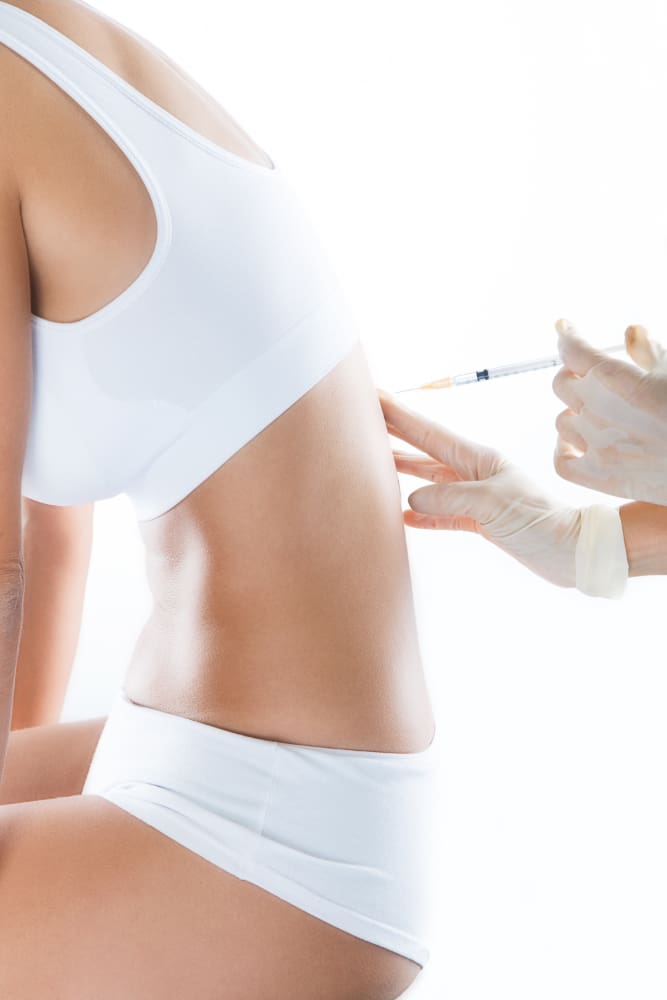 Woman Receiving Semaglutide Weight Loss Injection On Her Back For Fat Reduction