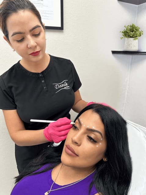 Patient receiving Dysport® injections to treat frown lines at Danik MedSpa.